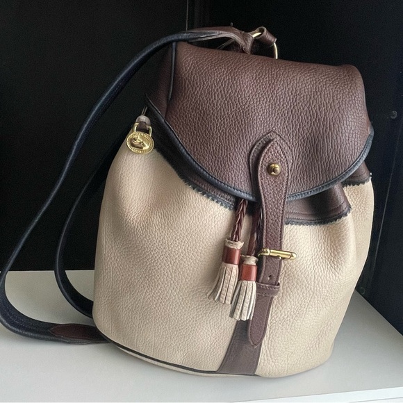 Dooney and Bourke Leather Teton Drawstring Backpack Bone Brown Navy multi color - Picture 1 of 16
